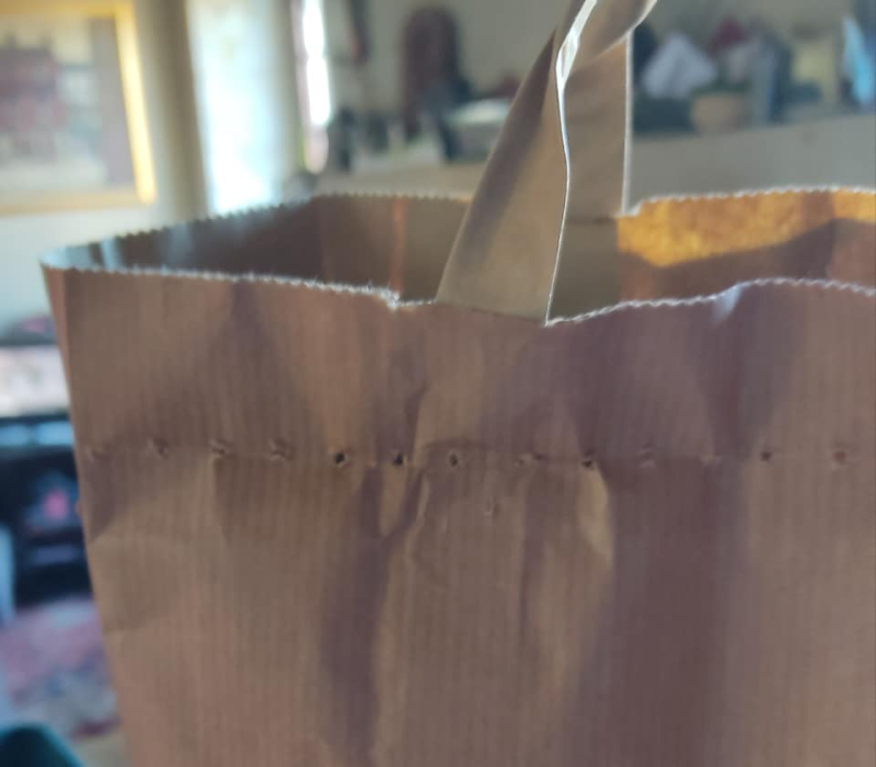 Opening a paper bag