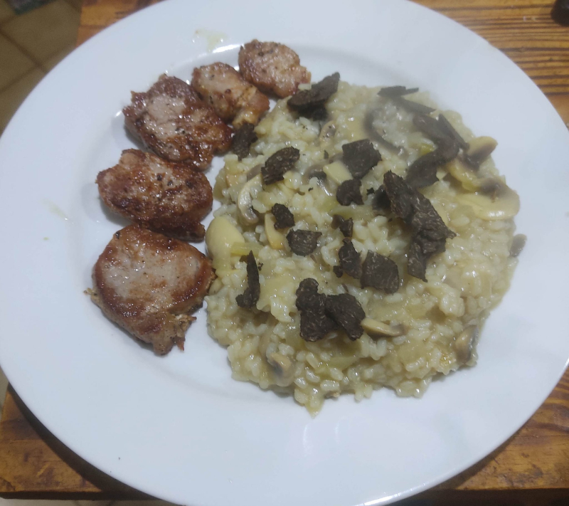 Pan fried medallions of pork loin with mushroom risotto and truffle